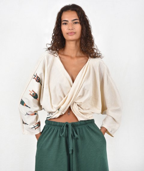 Polymorphic twisted blouse