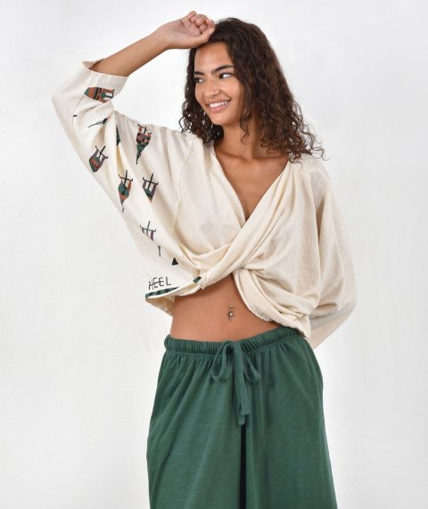 Polymorphic twisted blouse